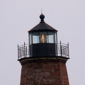 [Top of lighthouse with white light visible.]